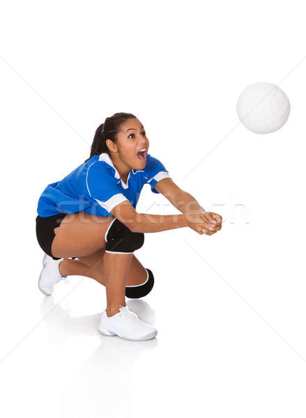 [[stock_photo]]: étonné · jeune · fille · jouer · volleyball · isolé · blanche