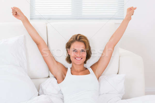 Happy Woman Stretching Arms Stock photo © AndreyPopov