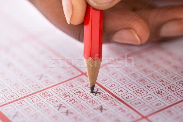 Személy szám lottó jegy közelkép személyek Stock fotó © AndreyPopov