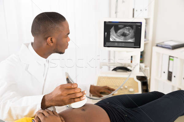Gynaecoloog zwangere ultrageluid buik vrouw arts Stockfoto © AndreyPopov