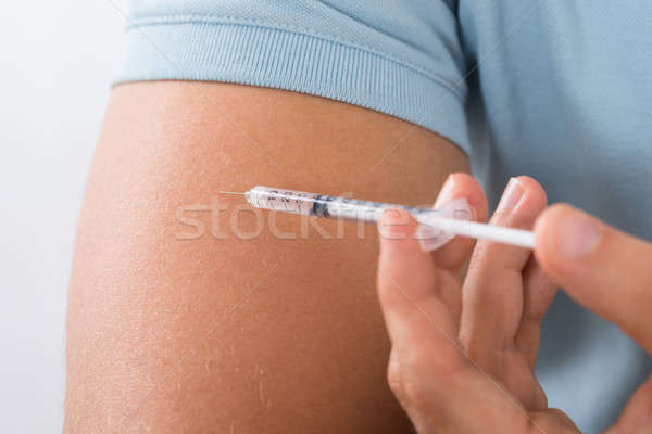 Diabetic Man Injecting Arm Stock photo © AndreyPopov