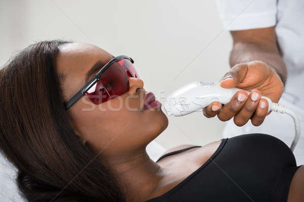 Nő epiláció lézer kezelés arc közelkép Stock fotó © AndreyPopov