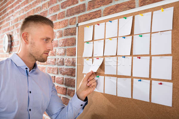 Stock photo: Businessman Looking At Notes