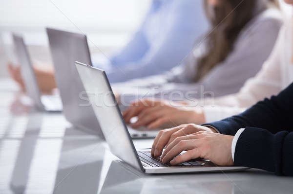 Hands On Laptop Keypad Stock photo © AndreyPopov