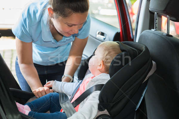 Mother Taking Care Of Her Baby In Car Stock photo © AndreyPopov