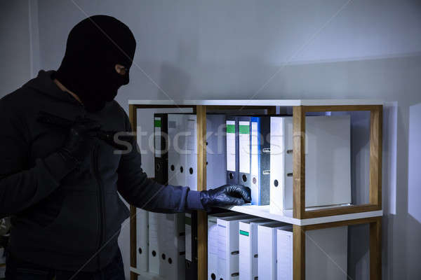 Dieb Diebstahl Datei Regal tragen Arbeitsplatz Stock foto © AndreyPopov