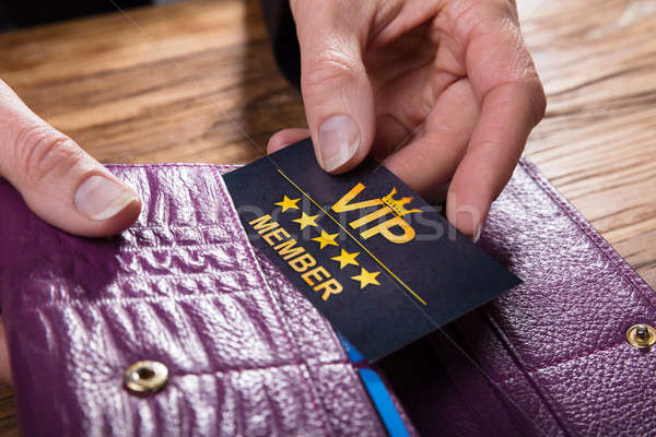 Businessperson Removing Vip Card From Purse Stock photo © AndreyPopov