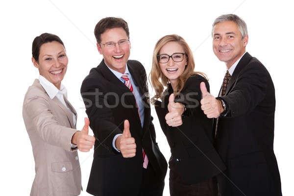 Business Führungskräfte lachen Gruppe Genehmigung Stock foto © AndreyPopov