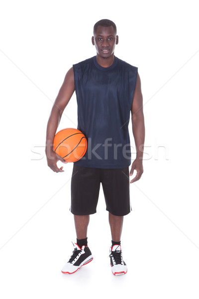 Afryki młody człowiek koszykówki gracz biały piłka nożna Zdjęcia stock © AndreyPopov