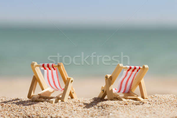 Kettő miniatűr fotó homokos tengerpart tengerpart tenger Stock fotó © AndreyPopov