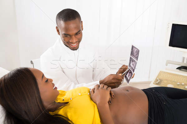 Médico ultrasonido escanear informe mujer embarazada Foto stock © AndreyPopov