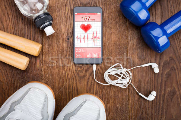 Exercise Equipment On Wooden Floor Stock photo © AndreyPopov