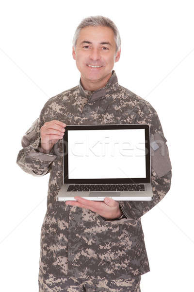 Mature Soldier Showing Laptop Stock photo © AndreyPopov