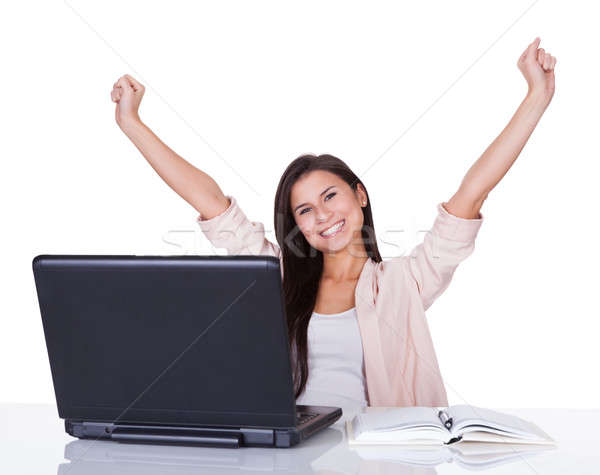 Happy female office worker rejoicing Stock photo © AndreyPopov