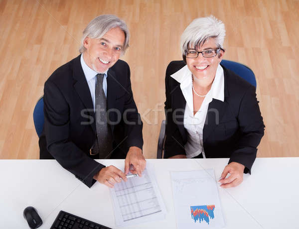 Idős partnerek üzleti megbeszélés mosolyog ül együtt Stock fotó © AndreyPopov