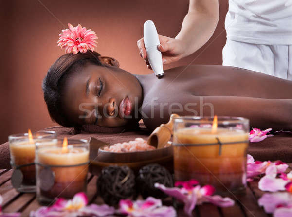 Woman Undergoing Microdermabrasion Therapy At Spa Stock photo © AndreyPopov