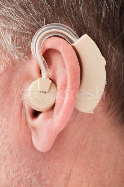 Persona audífono primer plano médicos tecnología Foto stock © AndreyPopov