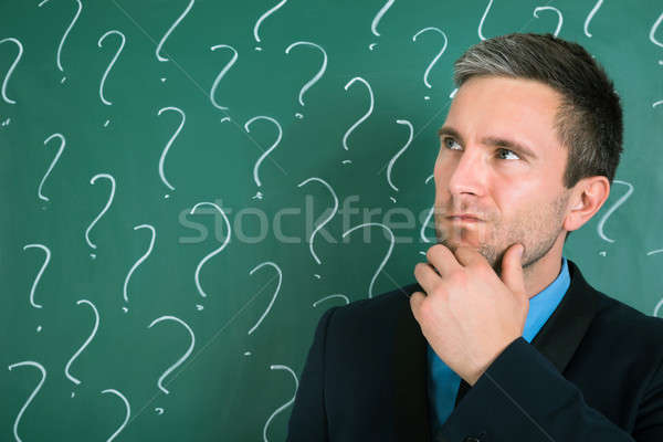 Portrait Of Contemplated Businessman Stock photo © AndreyPopov