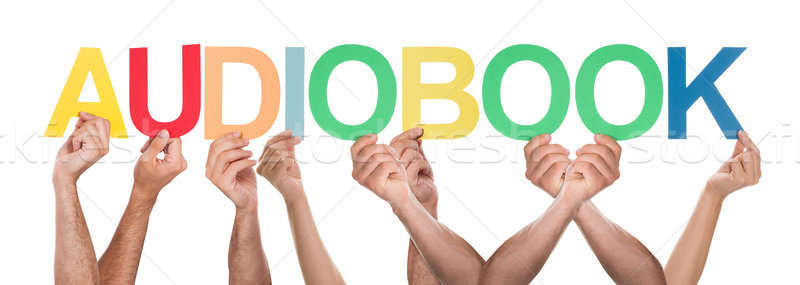 Group Of Hands Holding Multi-colored Text Audio Book Stock photo © AndreyPopov