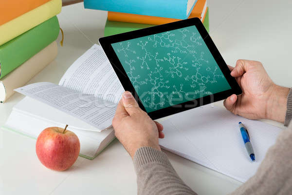 Student Learning Chemical Formulas On Digital Tablet Stock photo © AndreyPopov
