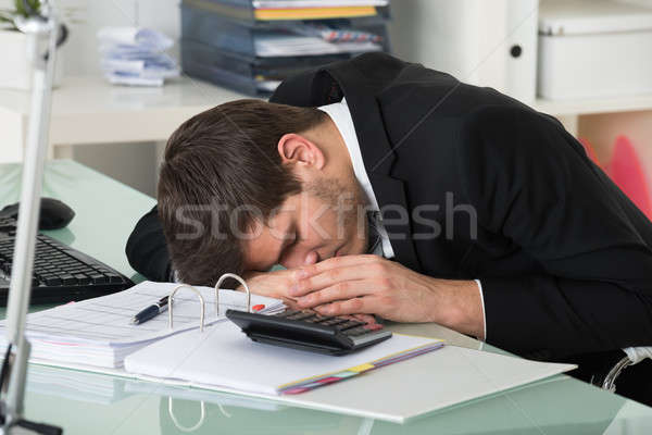 Businessman Sleeping With Invoice On Desk Stock photo © AndreyPopov