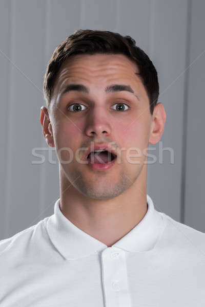 Portrait Of Surprised Man Stock photo © AndreyPopov