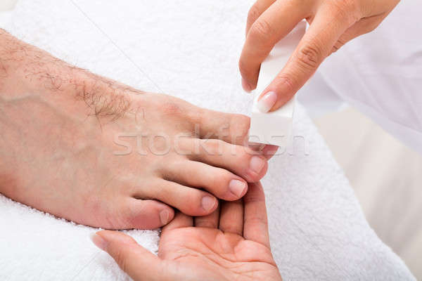 Beautician Hand Filing The Nails Stock photo © AndreyPopov