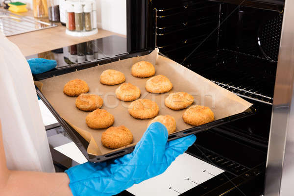 Femme plateau plein cookies four [[stock_photo]] © AndreyPopov