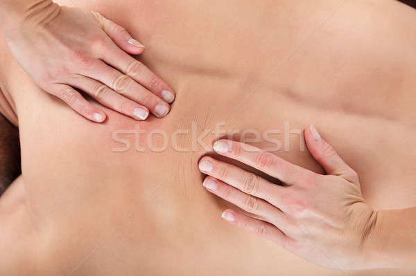 Masseur ontspannen Maakt een reservekopie massage man Stockfoto © AndreyPopov