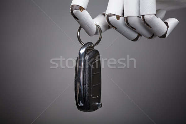 Robot Holding Car Key Stock photo © AndreyPopov