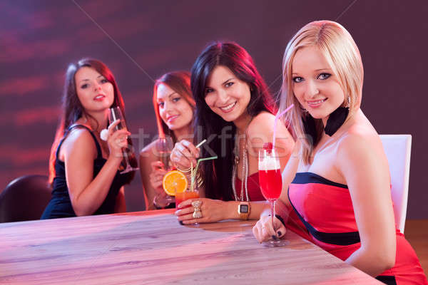 Female friends enjoying a night out Stock photo © AndreyPopov