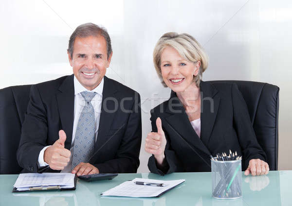 Businesspeople Showing Thump Up Sign Stock photo © AndreyPopov