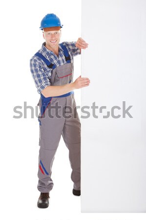 Portrait of happy handyman Stock photo © AndreyPopov