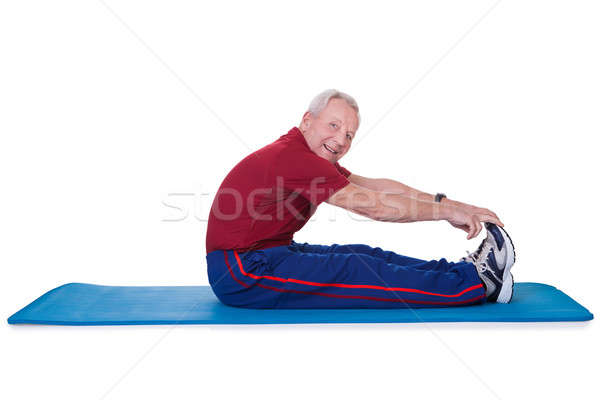 Senior Man Stretching His Legs Stock photo © AndreyPopov