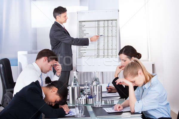 Bored Employees In Business Meeting Stock photo © AndreyPopov
