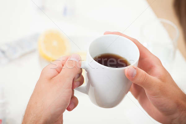 Hands Lemon Tea Cup Stock photo © AndreyPopov