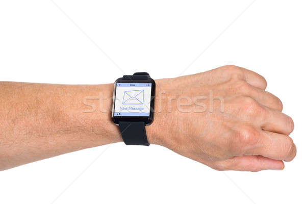 Hand Wearing Smartwatch Showing New Message Stock photo © AndreyPopov