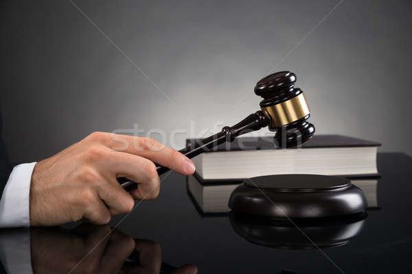 Close-up Of Judge Hitting Gavel Stock photo © AndreyPopov