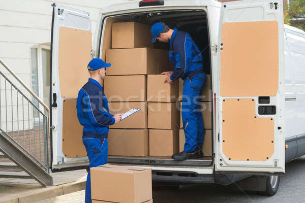 Delivery Men Unloading Boxes Stock photo © AndreyPopov