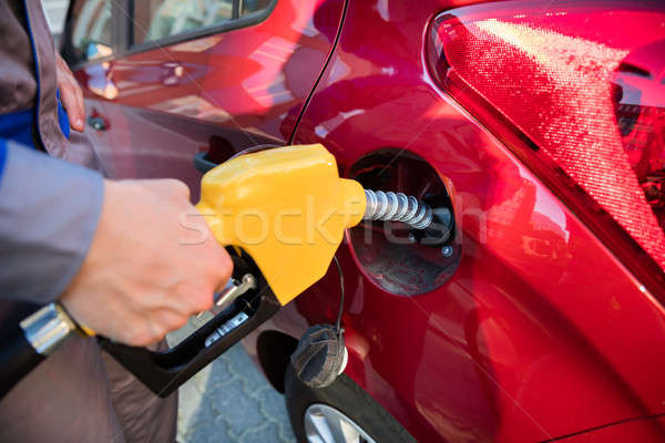Person's Hand Refueling Car's Tank Stock photo © AndreyPopov