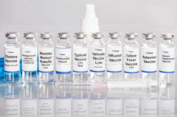 Spuit vaccin flessen verschillend rij Stockfoto © AndreyPopov