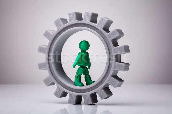 Human Figure Walking In Gray Gear Stock photo © AndreyPopov