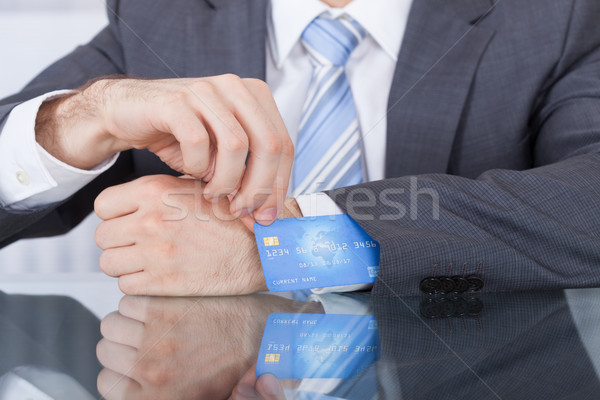 Empresario tarjeta de crédito manga primer plano traje negocios Foto stock © AndreyPopov