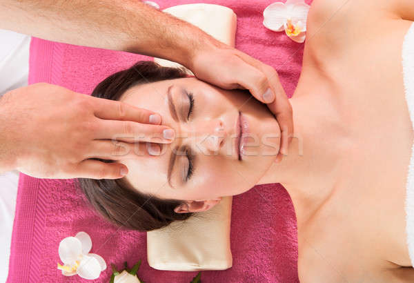 Woman Receiving Head Massage In Beauty Spa Stock photo © AndreyPopov