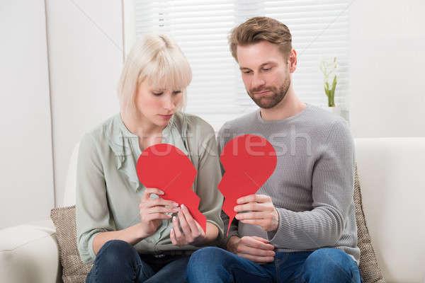 Pár tart piros összetört szív szomorú ül Stock fotó © AndreyPopov