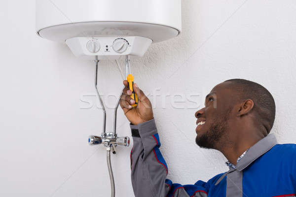 Trabajador eléctrica destornillador feliz jóvenes Foto stock © AndreyPopov