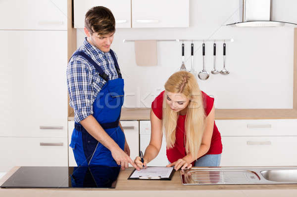 Masculina fontanero mujer signo factura Foto stock © AndreyPopov