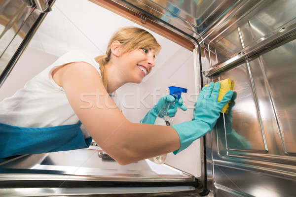 若い女性 洗浄 食器洗い機 小さな 幸せ ストックフォト © AndreyPopov