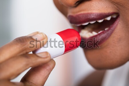 Stock photo: Happy Businessman Holding Red Play Button