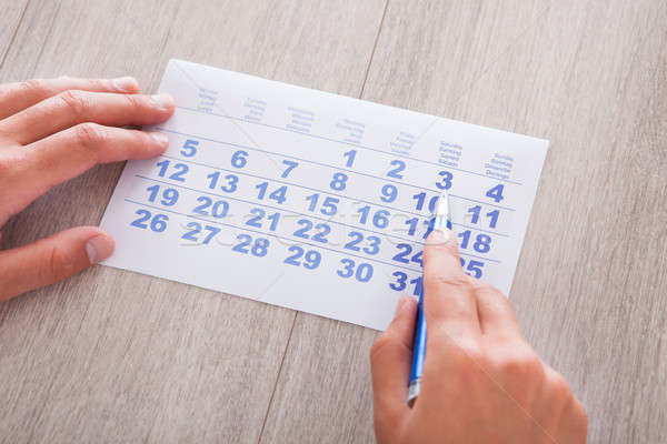Hand Holding Calendar And Pen Stock photo © AndreyPopov